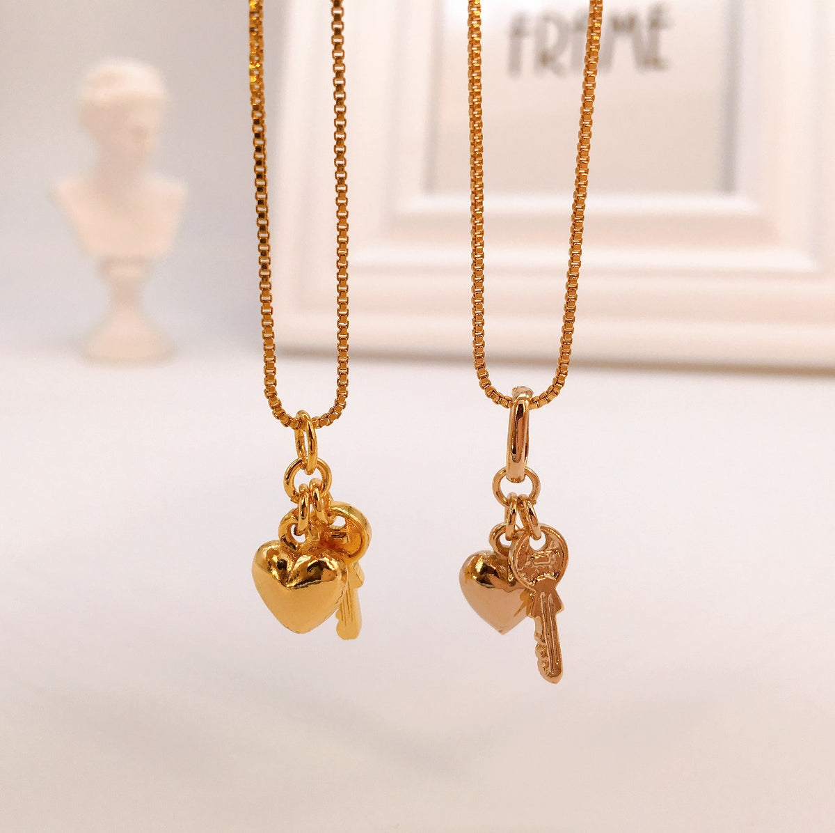 Gold heart and 2025 key necklace